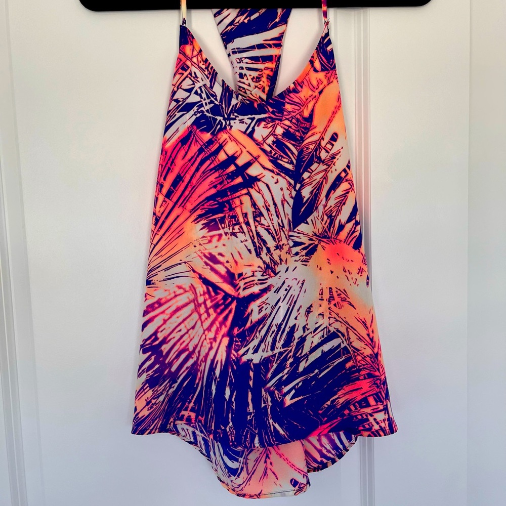 Razor back flowy top.